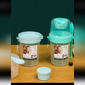 To go salad container with dressing container and fork